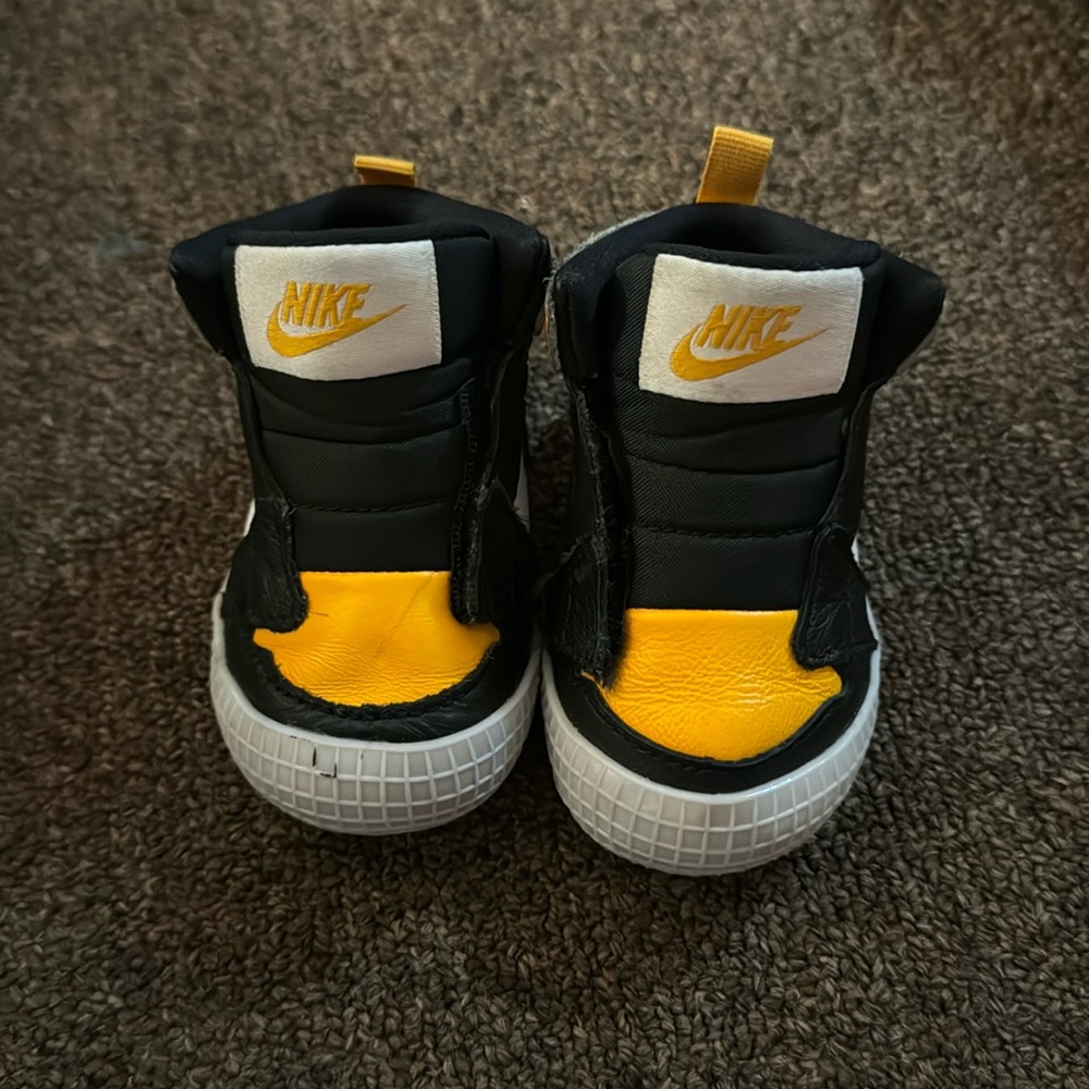 Yellow, black, and white Air Jordan's